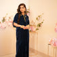 Navy blue velvet kaftan with V neckline cinched waist and embellishment