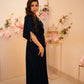 Navy blue velvet kaftan with V neckline cinched waist and embellishment