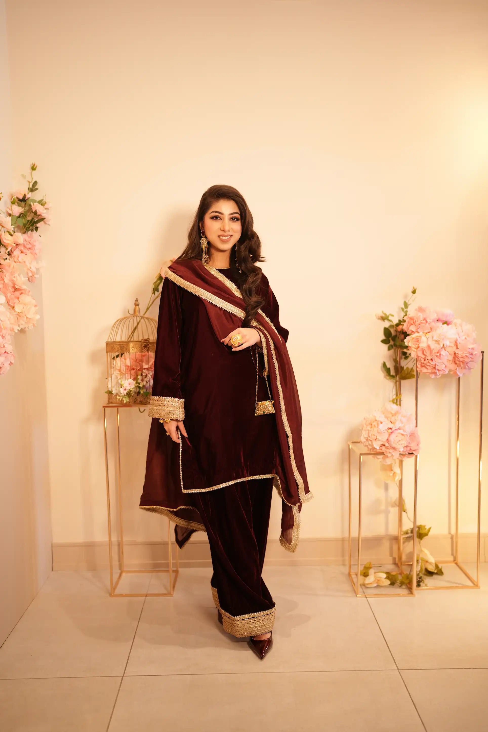 Deep maroon 3 piece velvet suit with farshi shalwar and gold embellishment